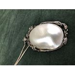 A VINTAGE ART NOUVEAU STYLE SILVER AND MOTHER OF PEARL PENDANT AND CHAIN.