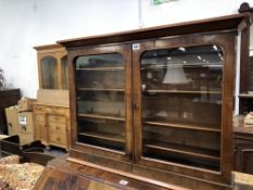 A 19th C. WALNUT WALL CABINET WITH FIVE SHELVES ENCLOSED BY GLAZED DOORS. W 82.5 x D 13 x H 60.