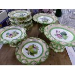 A 19th C. ENGLISH PORCELAIN DESSERT SERVICE PAINTED WITH FLOWERS WITHIN GREEN GUILLOCHE RIM BANDS