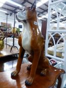 A LARGE BOXER DOG ORNAMENT.