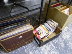 A LARGE COLLECTION OF RECORD ALBUMS AND SINGLES.