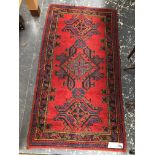 A TURKISH USHAK RUG 175 x 94 cms