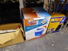 A BOXED MINI WASHING MACHINE, MANGLE AND PATIO CLEANER