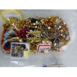 A QUANTITY OF PREDOMINATELY VINTAGE COSTUME JEWELLERY, EARRINGS, NECKLACES, BROOCHES ETC.