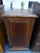 A LATE VICTORIAN BEDSIDE CABINET.