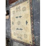 AN ANTIQUE ORIENTAL CARPET OF CHINESE DESIGN 356 x 278 cms