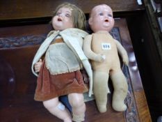 A VINATAGE ARMAND MARSEILLE DOLL AND ONE OTHER.