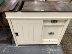 A MAHOGANY TOPPED WHITE PAINTED KITCHEN CABINET WITH A COMPARTMENT ABOVE A DOOR SLIDING OVER SHELVES