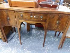 A GEORGIAN STYLE SERPENTINE MAHOGANY SIDE BOARD.