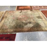 A VINTAGE MACHINE MADE CARPET OF PERSIAN HUNTING DESIGN 483 x 357cms