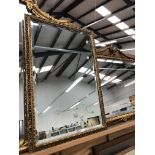 A GILT FRAMED BEVEL EDGED NEO-CLASSICAL STYLE MIRROR, H 76 W 96cms, TOGETHER WITH A SMALLER