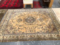 A MACHINE MADE CARPET OF PERSIAN DESIGN 345 x 442 cms