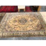 A MACHINE MADE CARPET OF PERSIAN DESIGN 345 x 442 cms