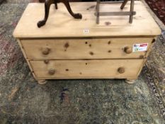 A 20th C.PINE TWO DRAWER CHEST. W 96 x D 45 x H 58cms.