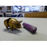 A VINTAGE BRASS PIG FORM COTTON DISPENSER, TOGETHER WITH A GUILLOCHE ENAMEL TOOTHPICK HOLDER.