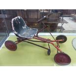 A VINTAGE PEDAL GO KART.