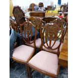 A SET OF SIX SHIELD BACK DINING CHAIRS