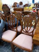 A SET OF SIX SHIELD BACK DINING CHAIRS