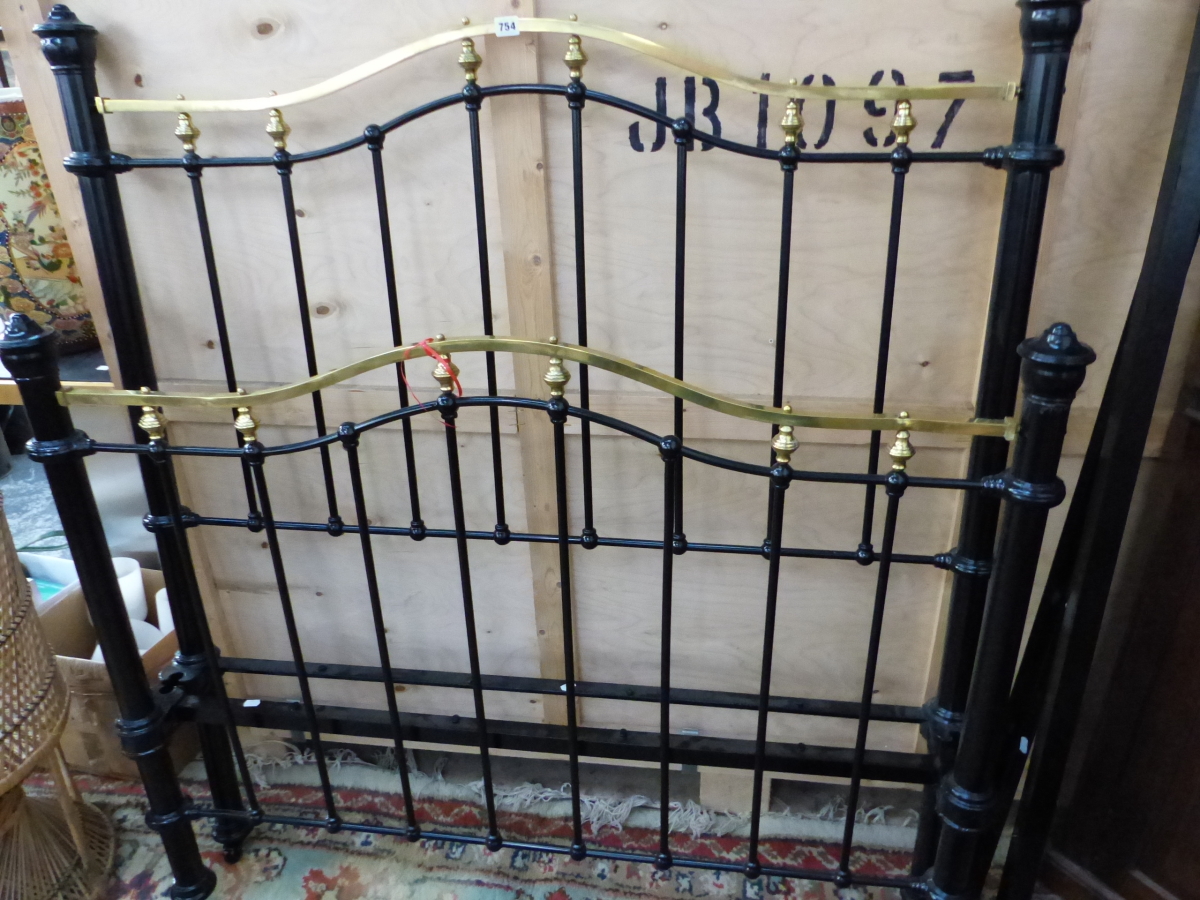 A VICTORIAN STYLE BRASS AND IRON BED FRAME.