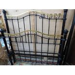 A VICTORIAN STYLE BRASS AND IRON BED FRAME.