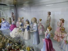 FIFTEEN FIGURES OF ELEGANT LADIES BY DOULTON, COALPORT AND OTHERS.