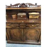 A VICTORIAN MAHOGANY CREDENZA, WAVY FOLIAGE ABOVE THE SHELF BACK, A SINGLE DRAWER ABOVE ROUND ARCH