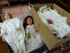 A COLLECTION OF VINTAGE COSTUME DOLLS MANY WITH STANDS.