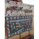 THREE WALL HANGINGS. ONE OF ARMORIAL DESIGN. A FRAGMENT OF THE BAYEAUX TAPESTRY AND ANOTHER OF