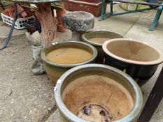 FOUR GLAZED PLANTERS, TWO COMPOSITE BIRD BATHS AND TWO GARDEN FIGURES