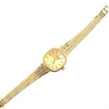 A LADIES 9ct HALLMARKED GOLD ROTARY QUARTZ WATCH ON A MILANESE STYLE BRACELET WITH A LADDER CLASP.