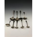 A PAIR OF GEORGE III SILVER TODDY LADLES, THREE OTHERS, THREE GEORGE III SILVER SALT SPOONS AND A