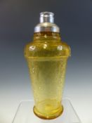 AN ART DECO METAL CAPPED STRAW YELLOW CRACKLED GLASS COCKTAIL SHAKER. H 23cms.