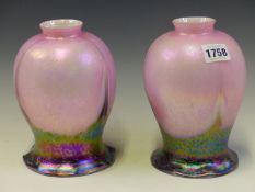 A PAIR OF INVERTED THISTLE SHAPED GLASS SHADES, THE ROUNDED UPPER PARTS IN PINK IRIDESCENT, THE