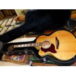 TAKAMINE G SERIES LEF-HANDLED ACOUSTIC GUITAR WITH CUTAWAY AND INTERNAL ELECTRICS AND HARD