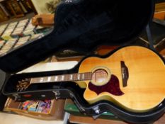 TAKAMINE G SERIES LEF-HANDLED ACOUSTIC GUITAR WITH CUTAWAY AND INTERNAL ELECTRICS AND HARD