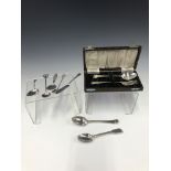 A CASED SILVER CHRISTENING SPOON AND FORK TOGETHER WITH A CADDY SPOON, BUTTER KNIFE AND FIVE OTHER
