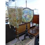 TWO VICTORIAN POLE SCREENS WITH NEEDLE WORK BANNERS AND ON TRIPODS, ONE IN MAHOGANY AND THE OTHER IN