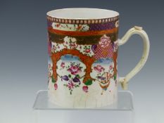 A CHINESE EXPORT MUG PAINTED WITH ROSES BELOW ARCHED VIGNETTES AND BANDS OF DIAPER AND CORALLITE