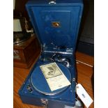 A 1930S HMV MODEL 102 WIND UP GRAMOPHONE IN A PORTABLE BLUE CASE
