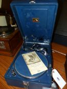 A 1930S HMV MODEL 102 WIND UP GRAMOPHONE IN A PORTABLE BLUE CASE