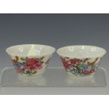 A PAIR OF FAMILLE ROSE TEA BOWLS PAINTED ON THEIR EXTERIORS WITH SQUIRRELS AMONGST FLOWERS, GEOFFREY