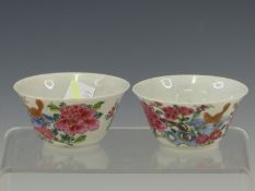 A PAIR OF FAMILLE ROSE TEA BOWLS PAINTED ON THEIR EXTERIORS WITH SQUIRRELS AMONGST FLOWERS, GEOFFREY