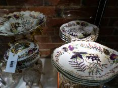 A 19th C. DERBY PART DESSERT SERVICE, EACH PIECE WITH TWO TREES FLOWERING CENTRALLY, THE FLUTED RIMS