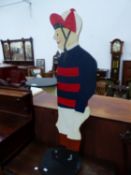 A JOCKEY DUMBWAITER. H 105cms.