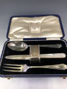 A CASED SILVER CHRISTENING SET BY JOHN SANDERSON AND SON, SHEFFIELD 1937, COMPRISING: A FORK, A