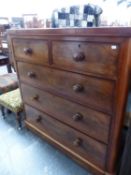 A VICTORIAN MAHOGANY CHEST OF TWO SHORT AND THREE LONG DRAWERS ON PLINTH FOOT. W 121 x D 52 x H