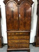 AN 18th C. WALNUT DOUBLE DOMED SECRETAIRE CHEST, THE TOP WITH TWO PANELLED DOORS ABOVE THE DRAW
