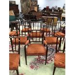 A SET OF TWELVE ANTIQUE BRASS INLAID MAHOGANY EARLY 19th C. DINING CHAIRS. FOUR ARMCHAIRS, EIGHT