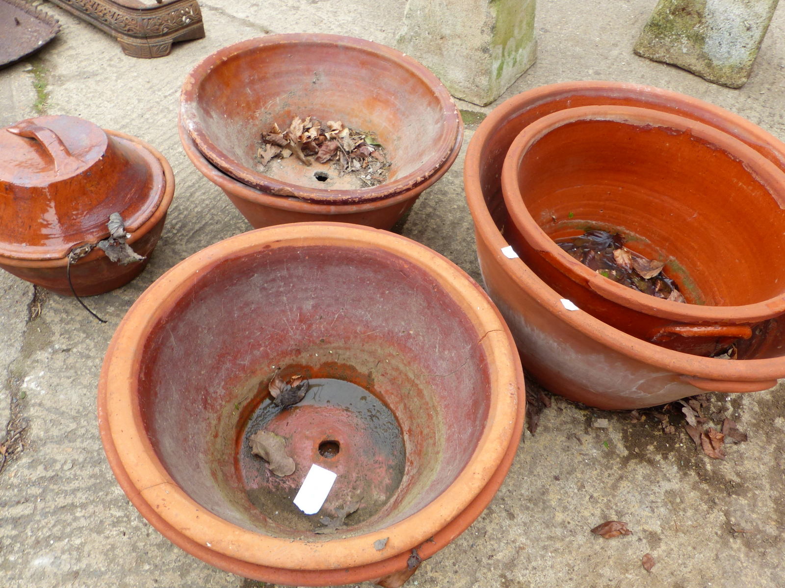 SEVEN TERRACOTTA PROVING POTS OF VARIOUS SIZES