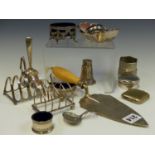 A SILVER TROWEL, BIRMINGHAM 1864, A SILVER TABLE BELL, TWO SILVER TOAST RACKS, A SILVER SWEET